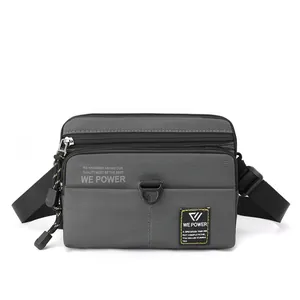 Dark grey multifunctional crossbody bag for men in durable water-resistant fabric
