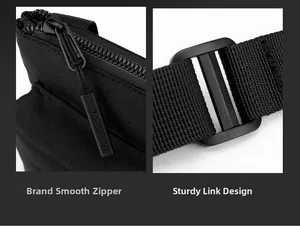 Detail of smooth brand zipper and sturdy connection design on black crossbody chest bag