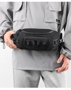 Detail of black ballistic nylon functional waist bag with MOLLE webbing and buckle system