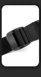 Detail of adjustable strap buckle and reinforced stitching on durable black crossbody bag