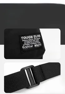 Detailed macro view of TOUGH SLHS woven brand logo and durable adjustable strap buckle