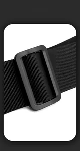 Close-up of durable black plastic adjustment buckle and nylon strap for functional backpacks
