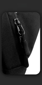 Detailed macro view of the durable nylon fabric and secure black zipper on this sports bag
