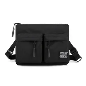 Black nylon crossbody chest bag with dual front pockets and adjustable strap