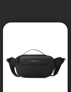 Detail view of the black sports chest bag showing smart storage space and matte tech fabric