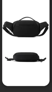 Detail of the breathable honeycomb mesh padding on the back of this black chest bag