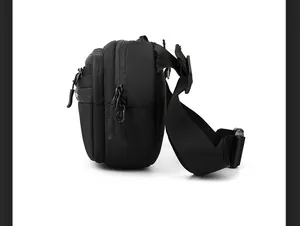 Side view of black tactical chest bag showing three zipper compartments and nylon texture