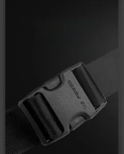 Detailed macro view of the durable plastic side-release buckle on a black nylon strap