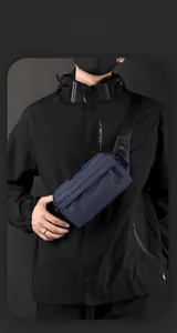 Detail view of water-resistant nylon crossbody bag with adjustable strap and smart storage