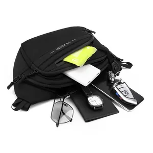 Minimalist black tactical chest bag with multiple zipper compartments for outdoor travel