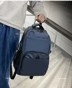 Detail of navy blue nylon laptop backpack with side adjustable buckles and mesh pocket
