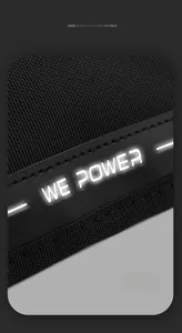 Macro shot of reflective WE POWER logo on textured black nylon crossbody bag strap