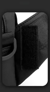 Detail of nylon bag featuring velcro strap and honeycomb mesh fabric for durability