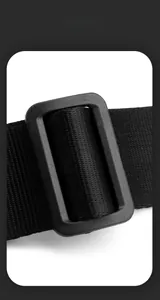 Detail of durable black nylon strap with high-density weave and plastic buckle adjustment