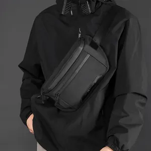 Men's minimalist black tactical nylon crossbody bag with waterproof zippers and techwear style