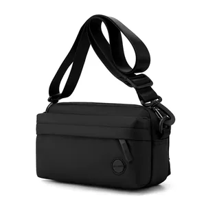 Minimalist black nylon crossbody bag with adjustable strap and large capacity for men