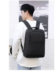 Side view of black water-resistant business laptop backpack with padded shoulder straps