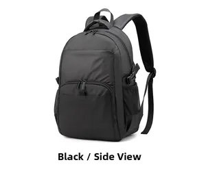 Side view of black nylon backpack showing waterproof fabric and multiple zipper compartments