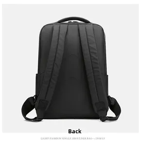 Detail view showing the ergonomic padded shoulder straps and back panel of the black backpack