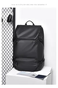Front view of black waterproof business backpack with functional buckles and multiple pockets