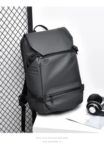Waterproof matte dark gray business backpack with multi-compartment lid and buckle detail