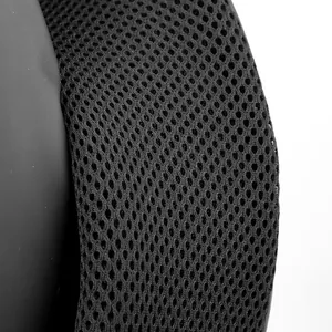 Détail du tissu en maille nid d'abeille respirant d'un sac à dos pour ordinateur étanche