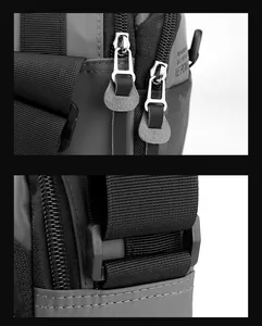 Close-up of waterproof nylon fabric, dual metal zippers and adjustable woven strap details