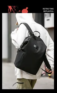 Detailed view of black nylon casual backpack featuring modern minimalist utility style