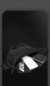 Detail view of black waterproof nylon waist bag with multiple storage compartments