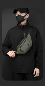 Detail view of olive green waterproof nylon crossbody chest bag for men showing smart storage