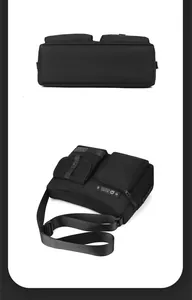 Detail view of water-resistant black crossbody bag with multiple functional pockets