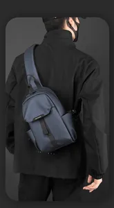 Detail of waterproof nylon chest bag featuring adjustable strap and WE POWER logo