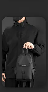 Detail of waterproof nylon chest bag with adjustable straps and smart storage pocket