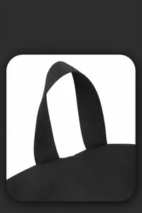 Detailed close-up of the reinforced top handle and durable nylon fabric of the black backpack
