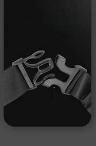 Close-up of quick-release plastic buckle and nylon strap on black casual chest bag