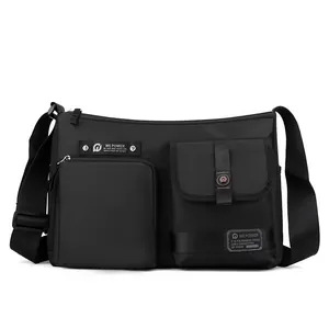 Men black nylon crossbody bag with dual front pockets and adjustable strap for outdoors