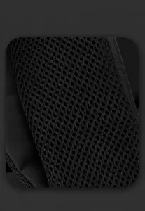 Detail of breathable honeycomb mesh padding and durable nylon fabric on back of backpack