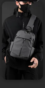 Detail view of water-resistant men's crossbody chest bag with adjustable shoulder straps