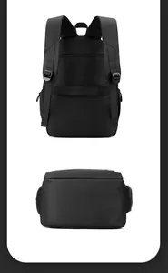 Detailed back view of black nylon backpack featuring a luggage strap and padded shoulder straps