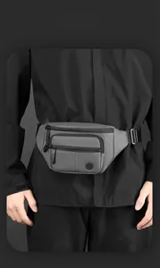 Gray multi-pocket waist bag with waterproof matte fabric and adjustable buckle strap