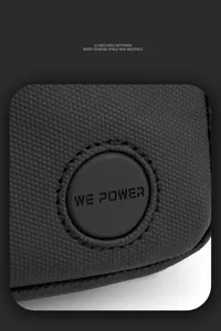 Detail of high-strength honeycomb fabric and embossed logo on casual black chest bag