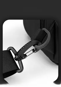 Detail of high-density nylon strap with durable D-ring and rotating plastic swivel hook