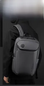 Detail view of water-resistant business backpack featuring a hidden zipper and side pocket