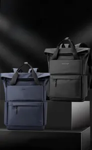 Vue détaillée des sacs à dos de voyage noir et bleu marine avec fermeture à rabat