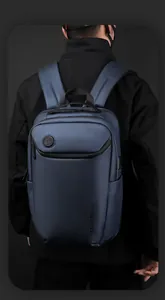 Rear view of a navy blue waterproof business laptop backpack with ergonomic straps