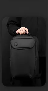 Close-up of waterproof business backpack with sturdy handle and branded logo detail