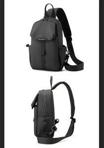Detail of waterproof nylon chest bag featuring adjustable mesh straps and zipped main pocket