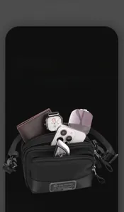Close-up of minimalist black crossbody bag with multiple zip pockets showing storage capacity
