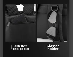 Détail de la poche antivol et de l'anneau D pour lunettes sur le sac à dos noir