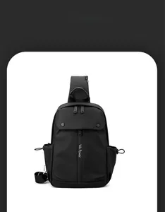 Detail showing the waterproof fabric and smart storage space of this black crossbody chest bag